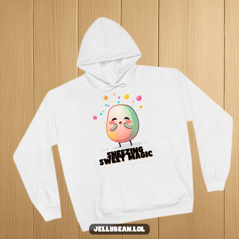 Funny hoodie showing a jelly bean character sneezing a cloud of colorful sugar dust, combining warmth with humorous, sweet imagery.