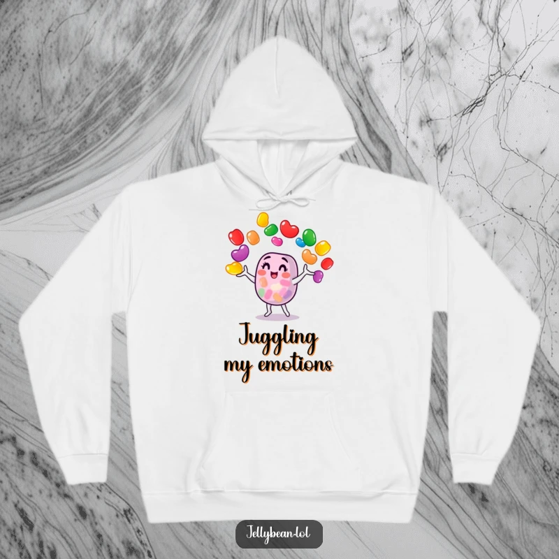 Funny jelly bean character juggling colorful treats on a cozy hoodie, a vibrant and humorous statement piece for cool weather.