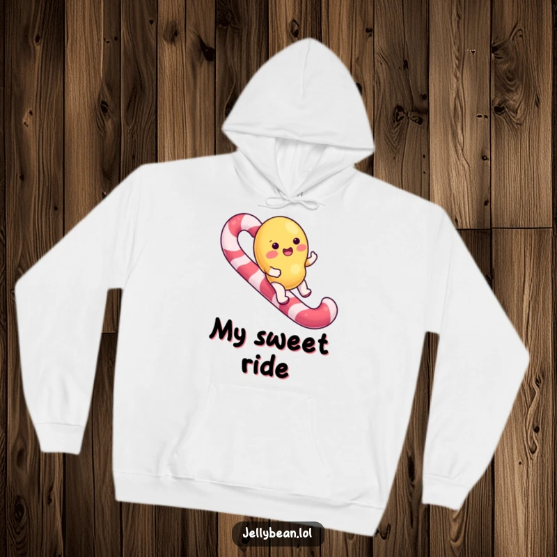 Funny Hoodie featuring a jelly bean character happily riding a giant candy cane, perfect for cozy and sweet moments.