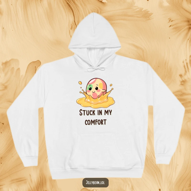 Funny Hoodie: A jelly bean character happily splashes in a syrup pool, offering warmth and a dose of sweet, playful humor.
