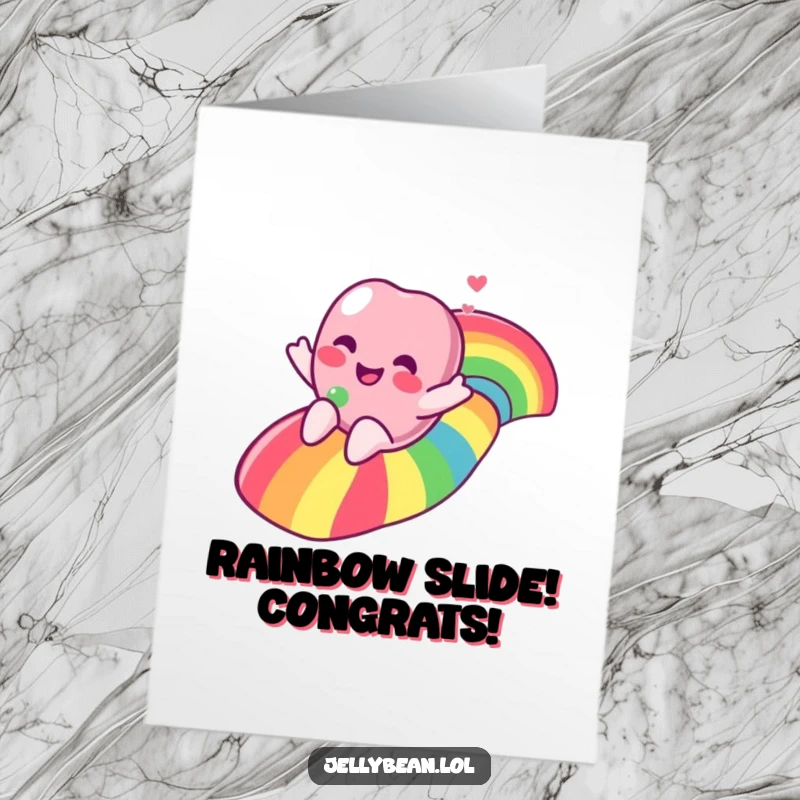 Funny Free Printable Congratulations Card of a happy jelly bean character sliding down a colorful rainbow path.
